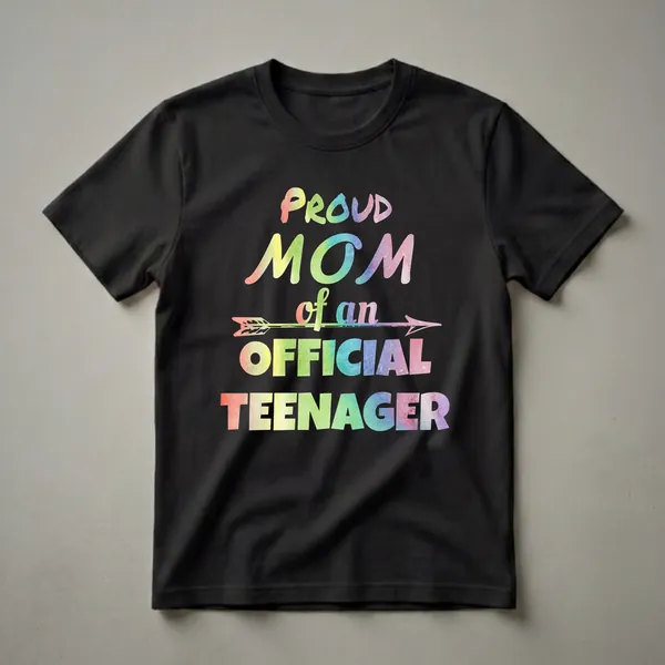 Black t-shirt with the text 'Proud Mom of an Official Teenager' in a colorful watercolor font, featuring an arrow graphic.