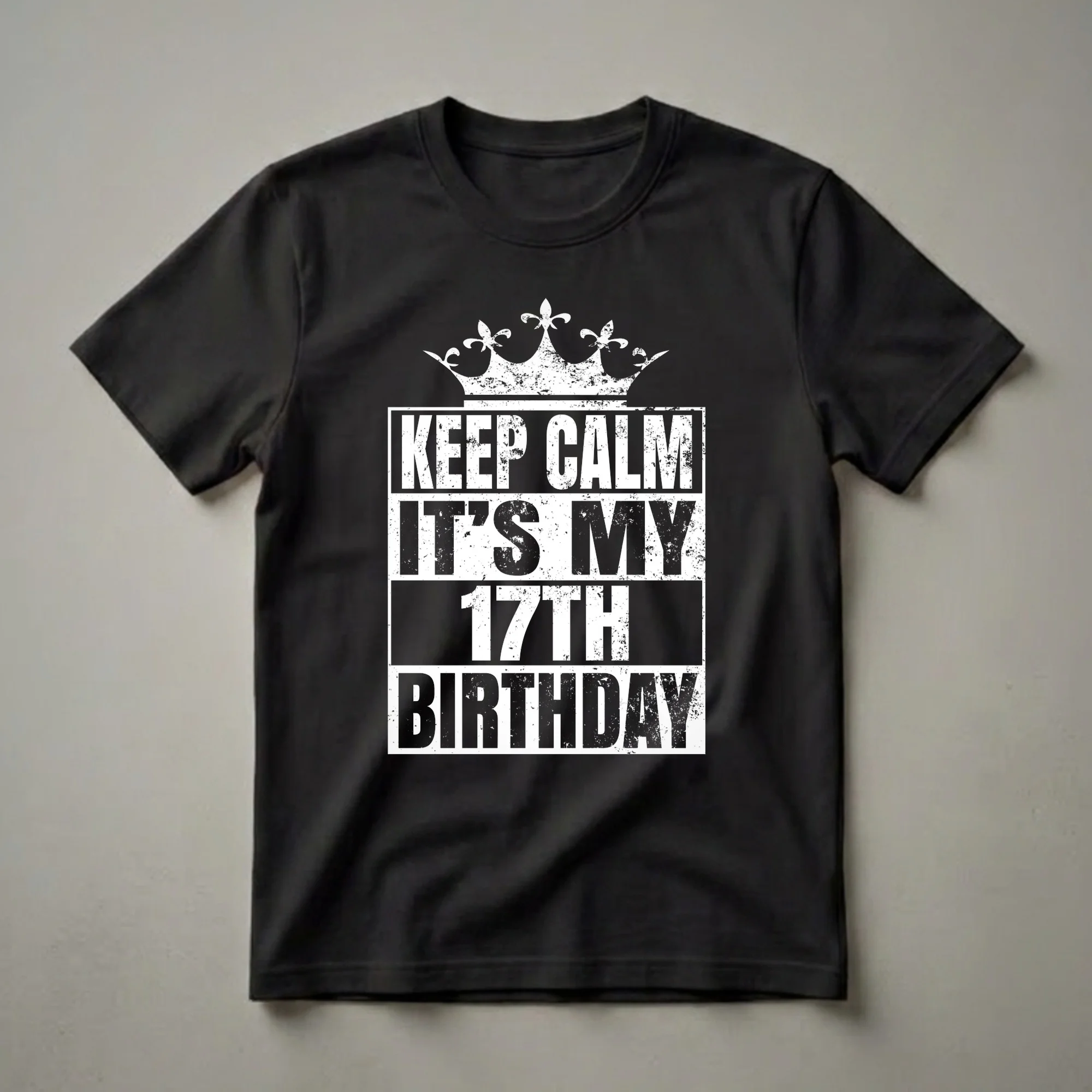 Black t-shirt with distressed white graphic text that reads 'KEEP CALM IT'S MY 17TH BIRTHDAY' and a distressed crown above.