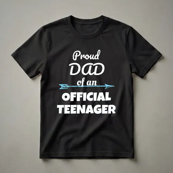 Black t-shirt with white text that reads 'Proud DAD of an OFFICIAL TEENAGER' and a blue arrow graphic.