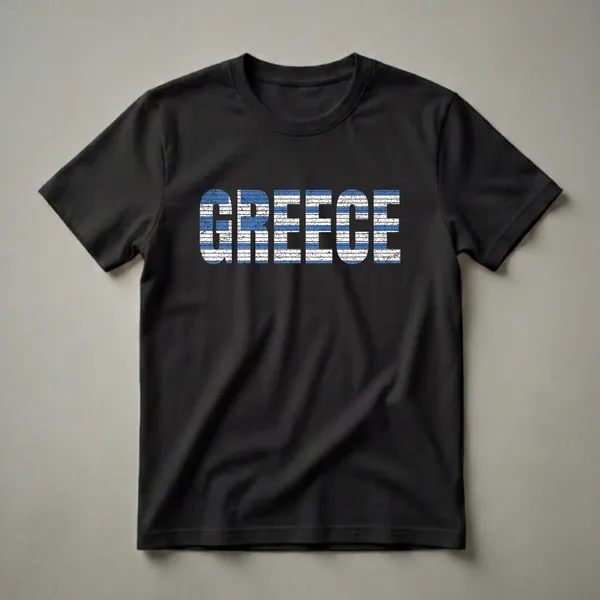 Black t-shirt with the word GREECE in large, distressed capital letters filled with the blue and white stripes of the Greek national flag.