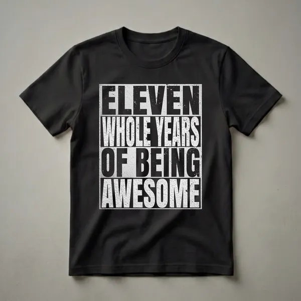 Black t-shirt with distressed white text reading 'ELEVEN WHOLE YEARS OF CELEBRATION' in stacked lines.