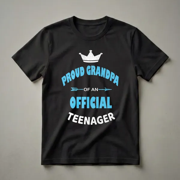 Black t-shirt with distressed blue and white text that reads 'Proud Grandpa of an Official Teenager' and a white crown graphic.