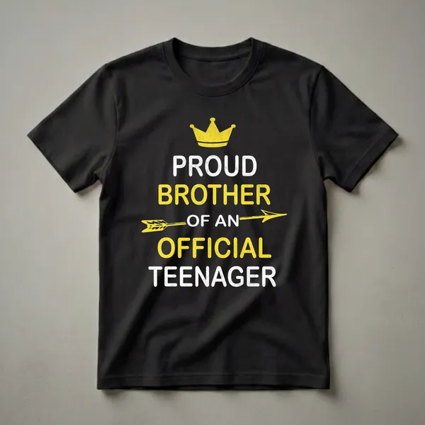 Black t-shirt with distressed white and yellow text that reads 'Proud Brother of an Official Teenager', topped with a yellow crown and a yellow arrow.