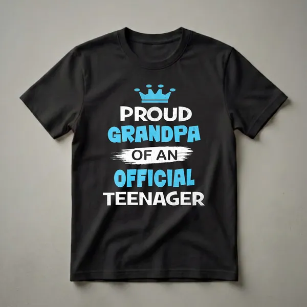 Black t-shirt with distressed blue crown and text reading 'PROUD GRANDPA OF AN OFFICIAL TEENAGER' in white and blue.