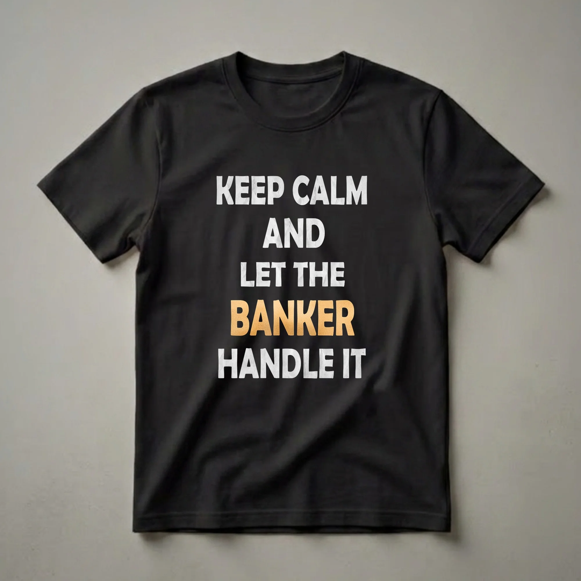 Black t-shirt with white and gold distressed text that reads 'KEEP CALM AND LET THE BANKER HANDLE IT'.