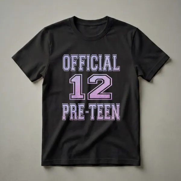 Black t-shirt with the words OFFICIAL 12 PRE-TEEN in large, collegiate-style font with a distressed purple and pink gradient fill.