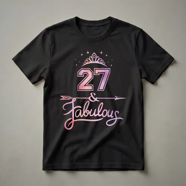 Black t-shirt with a pink and purple watercolor graphic design that reads '27 & Fabulous' with a crown and stars, for women celebrating their 27th birthday.