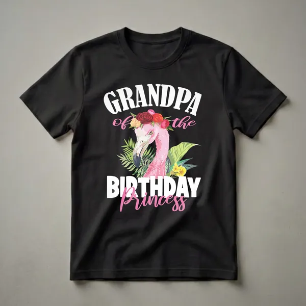 Black t-shirt with a graphic of a pink flamingo wearing a floral crown, surrounded by tropical leaves and flowers, with the text 'Grandpa of the Birthday Princess'.