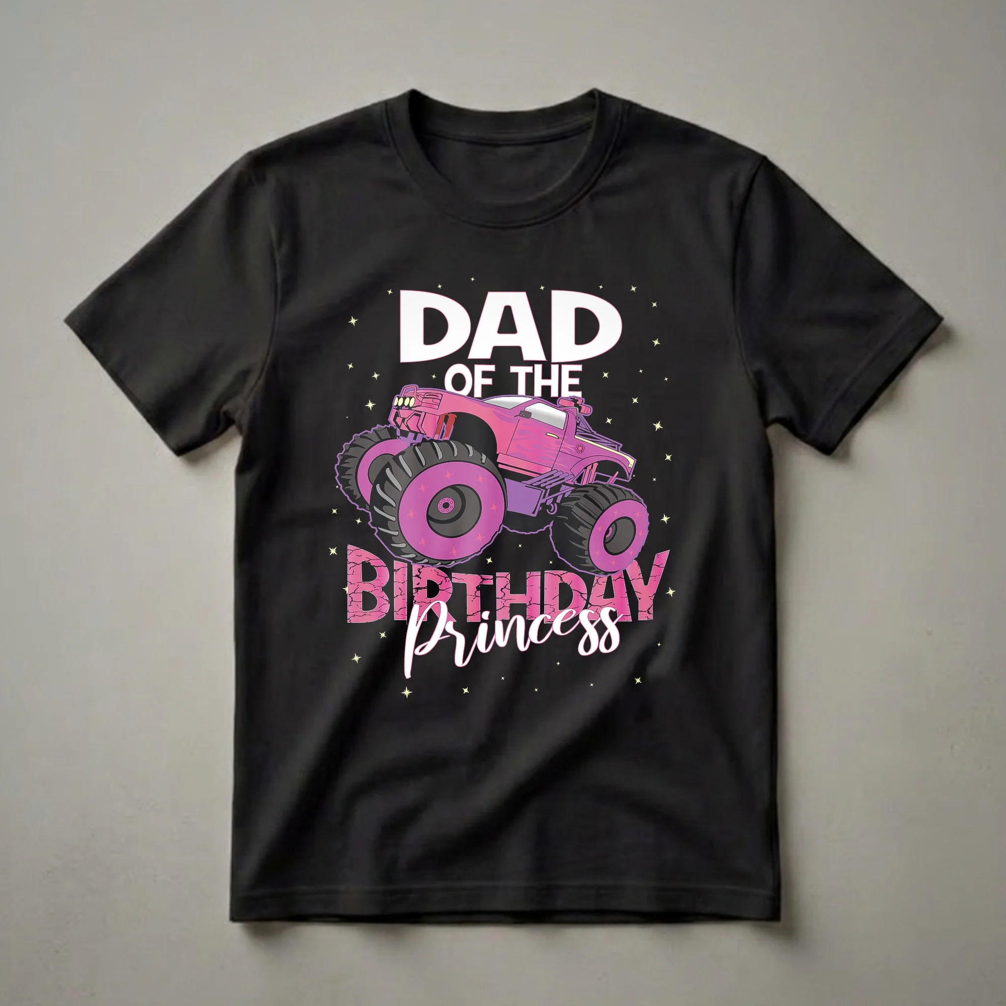 Black t-shirt with 'DAD OF THE BIRTHDAY PRINCESS' text and a pink monster truck graphic with purple wheels and yellow stars.