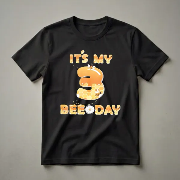 Black t-shirt featuring the text "It's My 3rd Bee Day" with a large number 3, all decorated with honey, honeycomb patterns, and cartoon bees, plus a daisy.