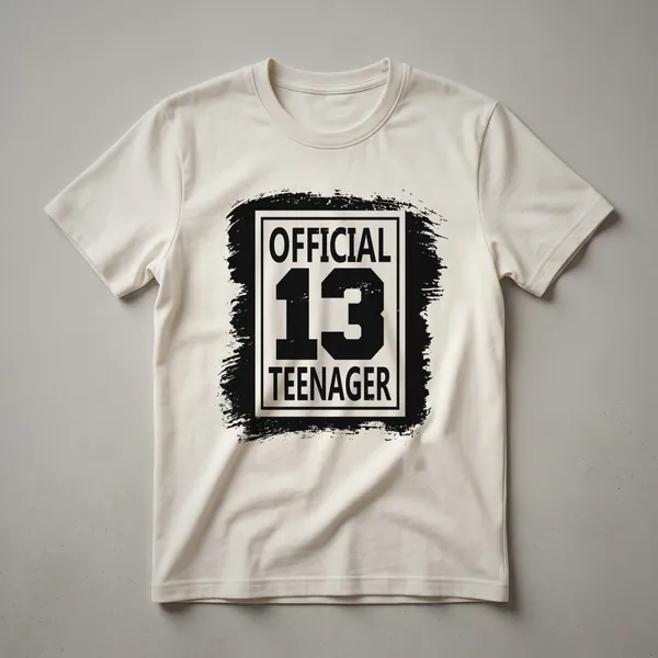 Black t-shirt with a distressed graphic that reads 'OFFICIAL TEENAGER' and 'OFFICIAL 13' with a large number 13 in the center.