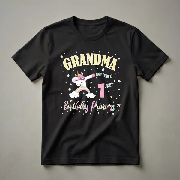 Black t-shirt with 'Grandma Of The 1st Birthday Princess' text, a dabbing unicorn on a rainbow, and colorful stars and dots.