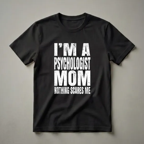 Black t-shirt with white distressed text that reads 'I'M A PSYCHOLOGIST MOM NOTHING SCARES ME'.