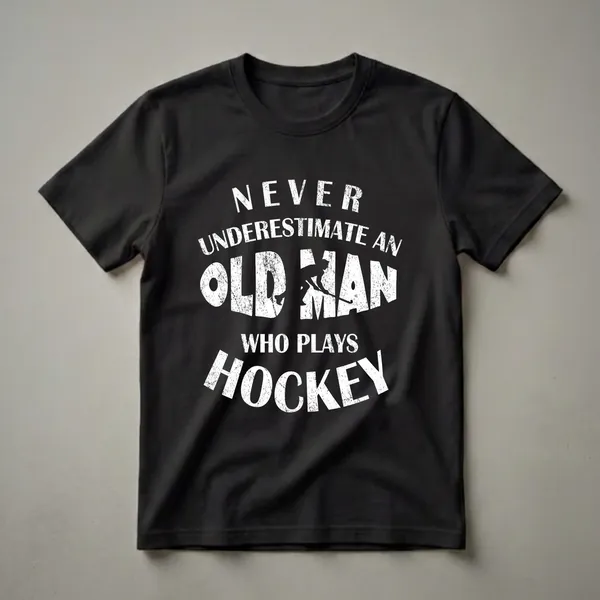 Black t-shirt with white distressed text that says 'NEVER UNDERESTIMATE AN OLD MAN WHO PLAYS HOCKEY' and a silhouette of a hockey player.