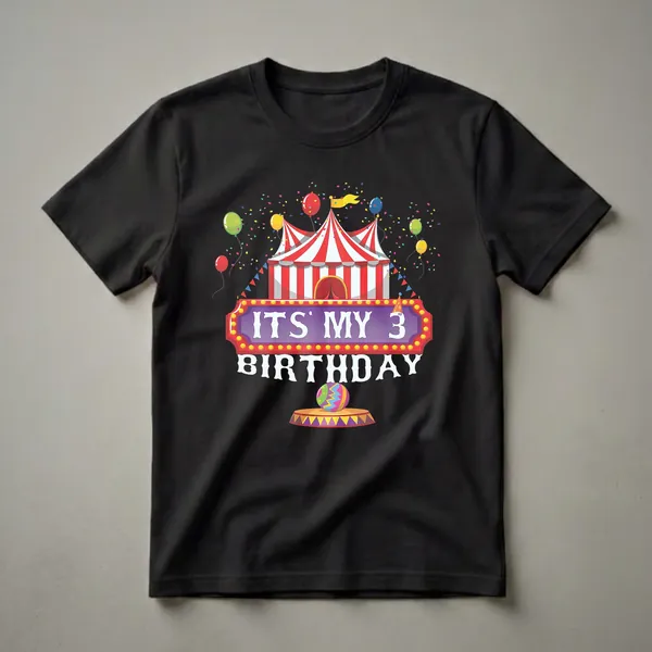 Black t-shirt with a colorful circus-themed graphic that reads 'It's My 3rd Birthday', featuring a circus tent, balloons, confetti, and a patterned ball.