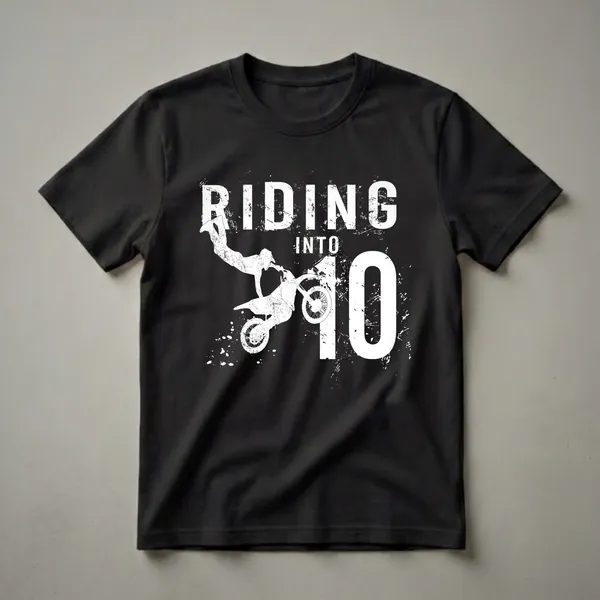 Black t-shirt with white graphic of a dirt bike rider jumping, with text 'RIDING INTO 10' in distressed white font.