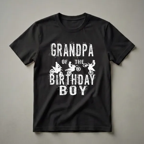 Black t-shirt with white text 'GRANDPA OF THE BIRTHDAY BOY' and three white silhouettes of motocross riders on dirt bikes.