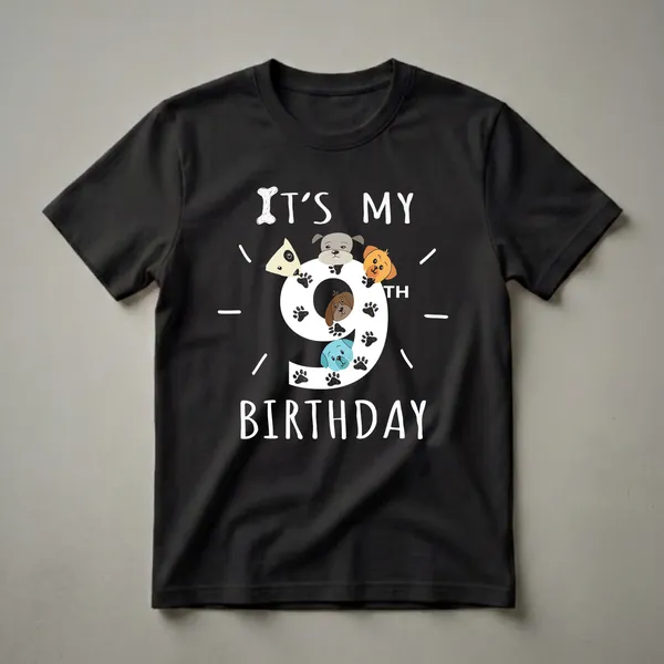 Black t-shirt with a graphic design that says 'IT'S MY 9TH BIRTHDAY' with cartoon dogs and paw prints surrounding the number nine.