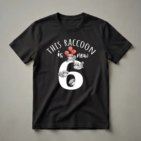 Black t-shirt with a graphic design that includes the number 6, four cartoon raccoons, and three red balloons, celebrating a 6th birthday.