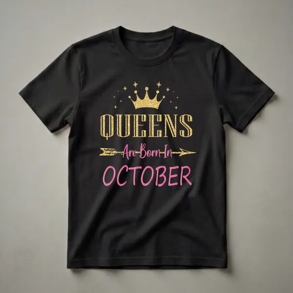 Black t-shirt with gold and pink graphic that reads 'QUEENS Are Born In OCTOBER' with a crown and stars.