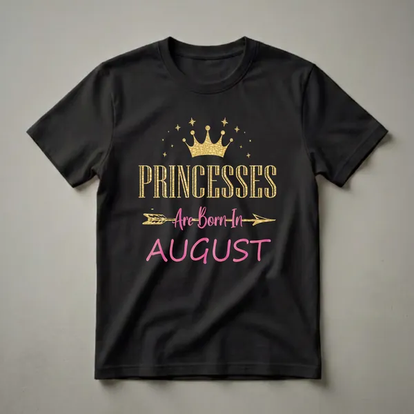 Black t-shirt with gold and pink graphic that reads 'PRINCESSES Are Born In AUGUST' with a golden crown and stars above.