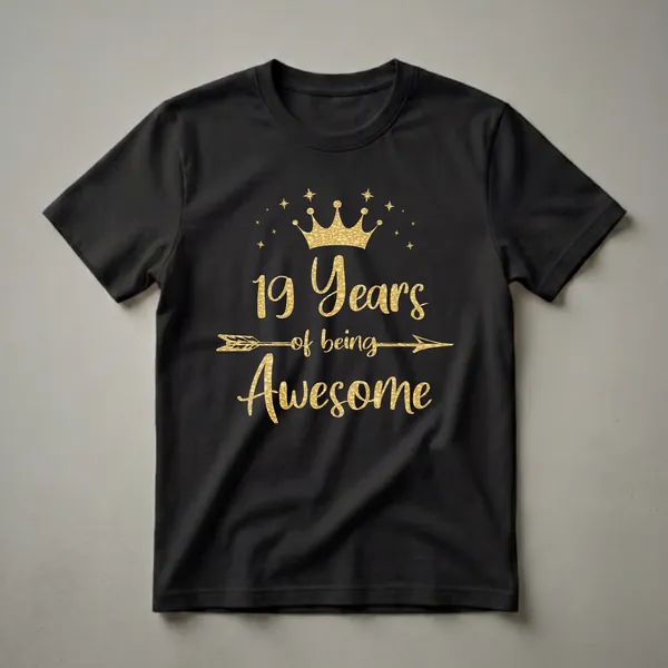 Black t-shirt with gold text that reads '19 Years of being eye-catching' and a gold crown graphic with stars.