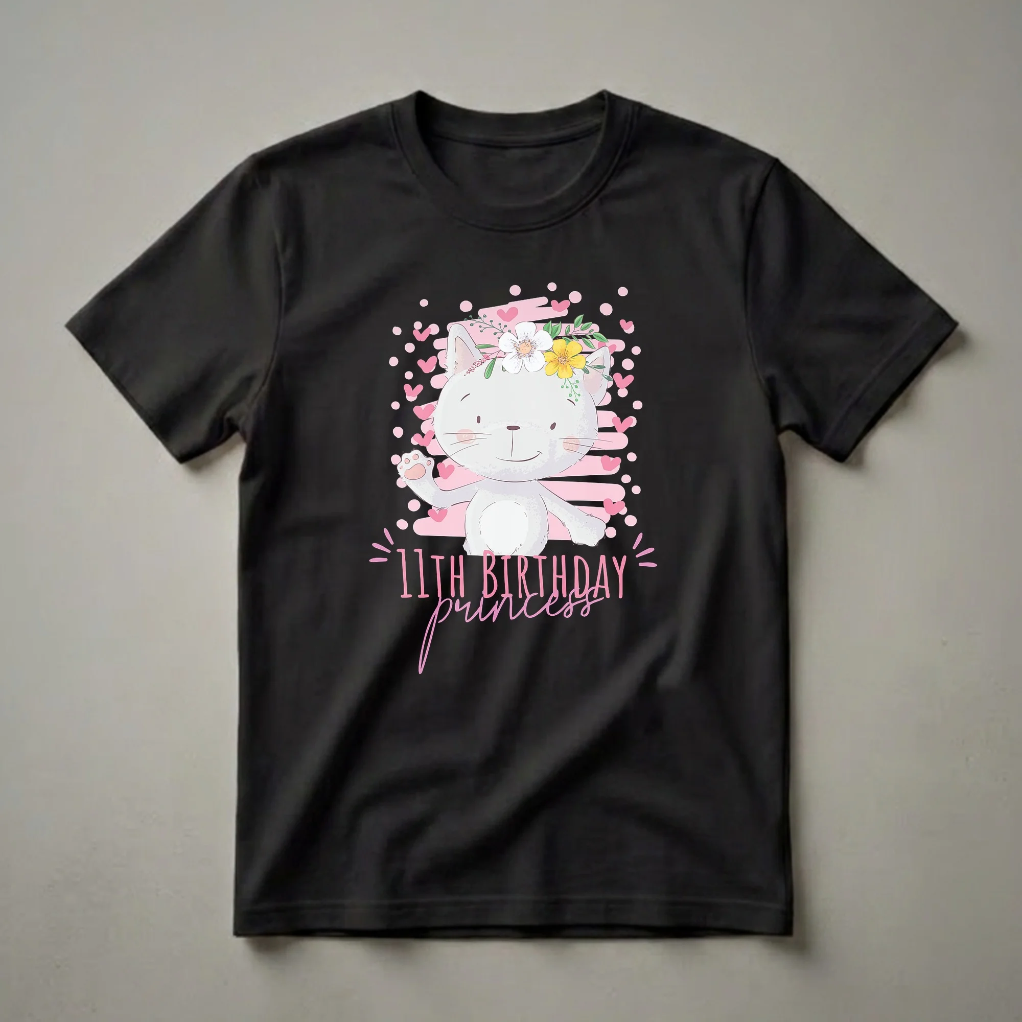 Black t-shirt featuring a cartoon white cat with a floral crown, pink hearts, polka dots, and the text '11th Birthday Princess'.