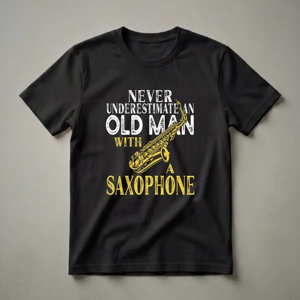 Black t-shirt with distressed white text reading 'Never Underestimate An Old Man With A Saxophone' and a yellow saxophone illustration.