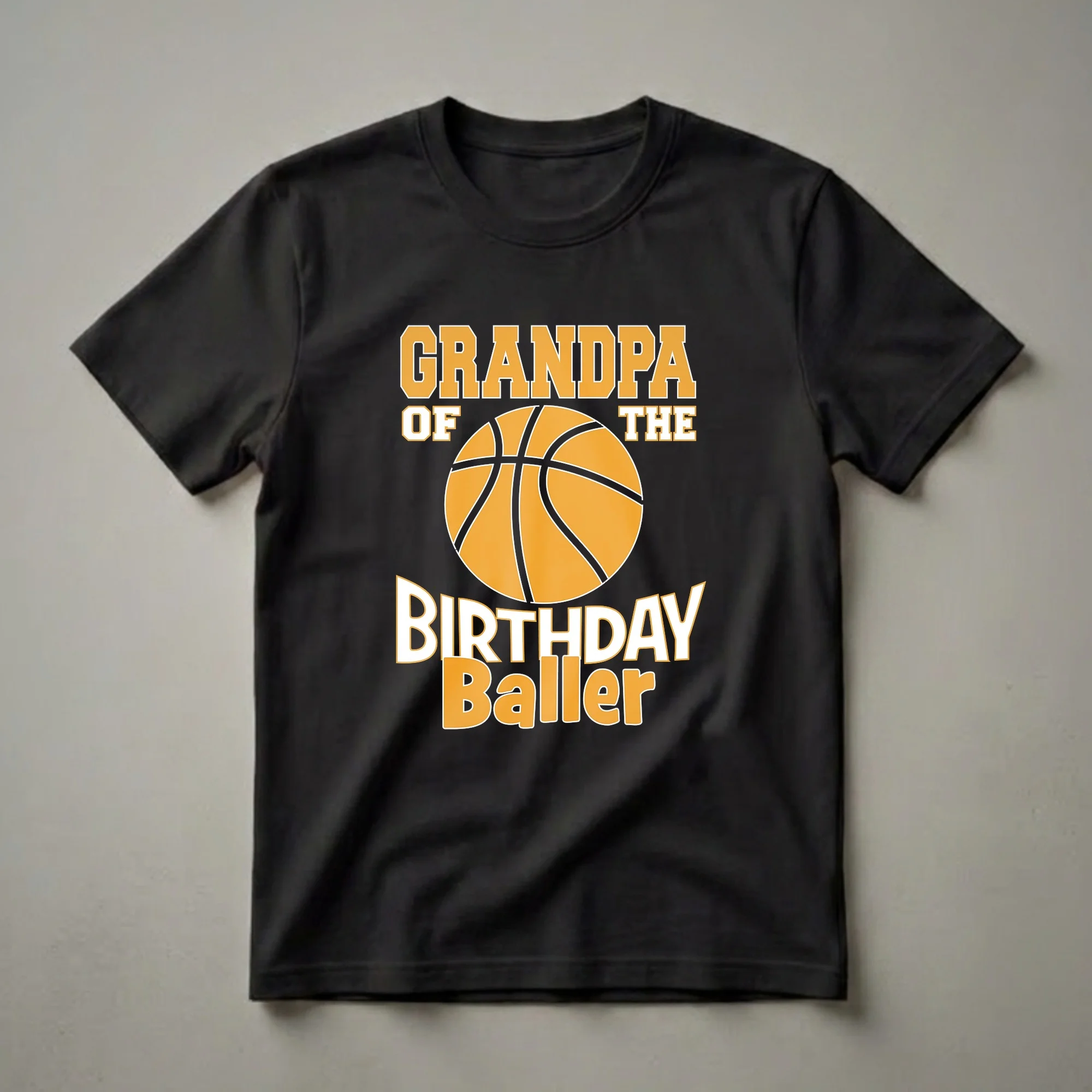 Black t-shirt with orange and white text that reads 'GRANDPA OF THE BIRTHDAY Baller' and a graphic of a basketball.