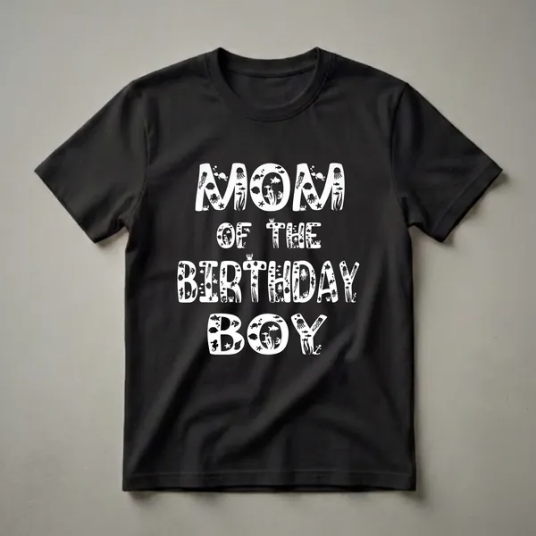 White 'Mom Of The Birthday Boy' graphic t-shirt featuring various sea creatures like fish, jellyfish, octopuses, turtles, and crabs filling the letters.