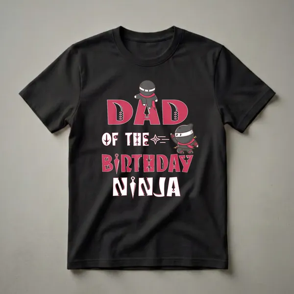 Black t-shirt with red and white text that reads 'DAD OF THE BIRTHDAY NINJA', featuring two cartoon ninjas and ninja weapon graphics.