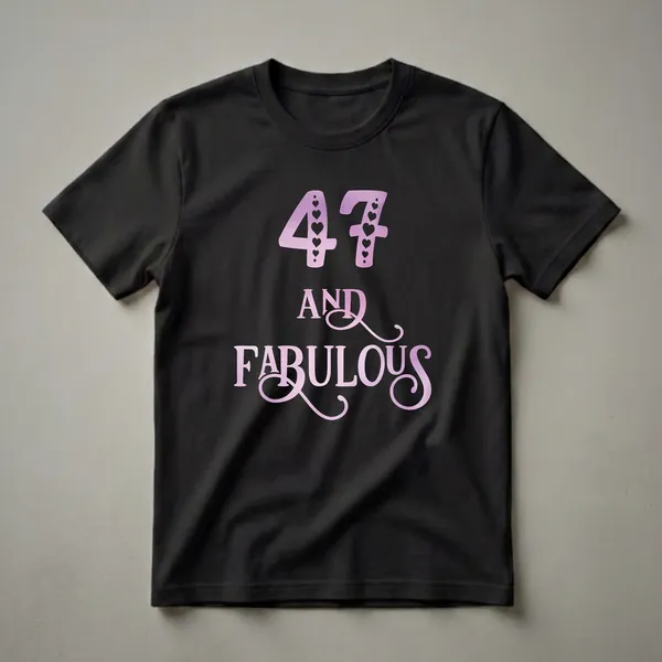 Black t-shirt with purple gradient watercolor text that reads '47 AND FABULOUS', featuring hearts within the number 47.