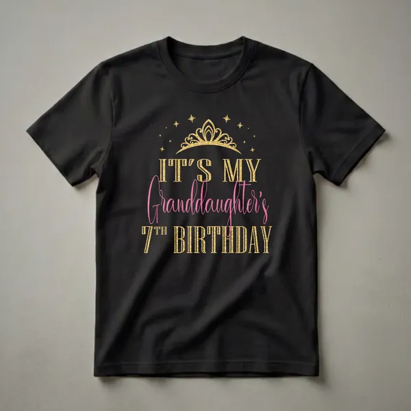 Black t-shirt with gold and pink text that reads 'It's My Granddaughter's 7th Birthday' with a gold crown and stars graphic.