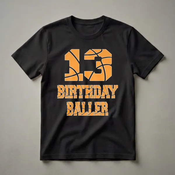 Black t-shirt with orange graphic design of the number 13 and the words 'BIRTHDAY BALLER', all textured like a basketball.