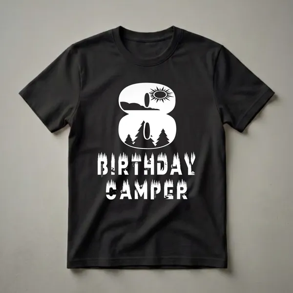 Black t-shirt with a white graphic design. The design includes the number 8 filled with a sun, clouds, and trees, and the words BIRTHDAY CAMPER below, also filled with camping imagery like rivers, mountains, and a cabin.