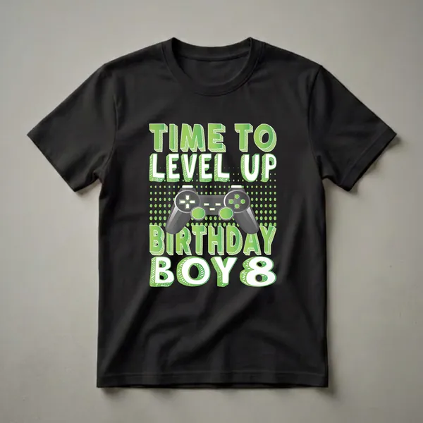 Black t-shirt with green text that reads 'Time To Level Up Birthday Boy 8' and a graphic of a video game controller.