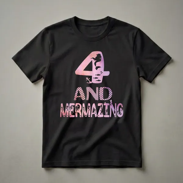 A black t-shirt featuring the text '4 And Mermazing' in pink and purple watercolor with mermaid and sea creature graphics.