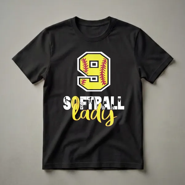 Black t-shirt with a large yellow number 9 featuring red softball stitching, the words "Softball Lady" in white and yellow, and silhouettes of softball players.