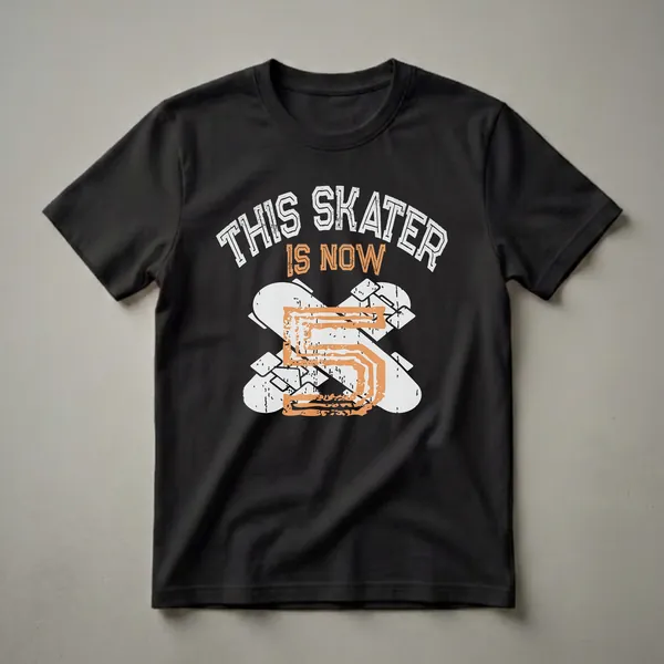 Black t-shirt with distressed graphic text 'THIS SKATER IS NOW 5' layered over two crossed grey skateboards.