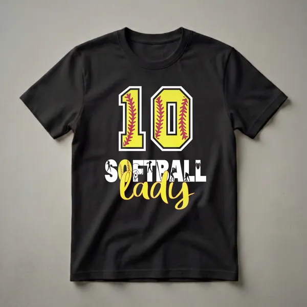 Black t-shirt featuring a large yellow number 10 with red softball stitching, and the words 'Softball Lady' below, surrounded by silhouettes of softball players and equipment.