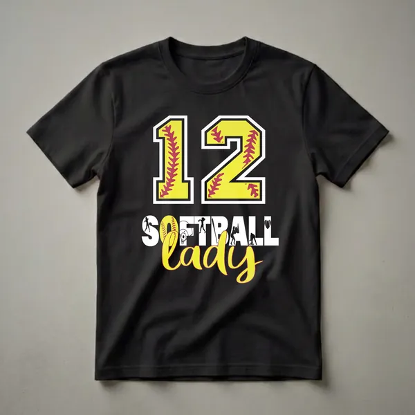 Black t-shirt with a graphic design featuring the number 12 in yellow with red softball stitching, and the words 'SOFTBALL LADY' with softball player silhouettes and imagery.