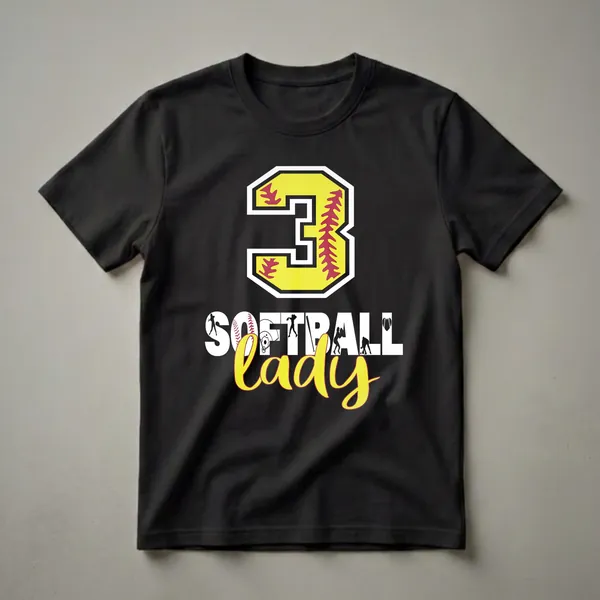 Black t-shirt featuring a large yellow number '3' with red softball stitching, the word 'SOFTBALL' with integrated baseball imagery, and the word 'lady' in yellow script.