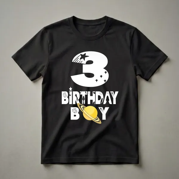 Black t-shirt with a white graphic design for a 3rd birthday boy, featuring the number 3, the words BIRTHDAY BOY, a planet, stars, rockets, and constellations.