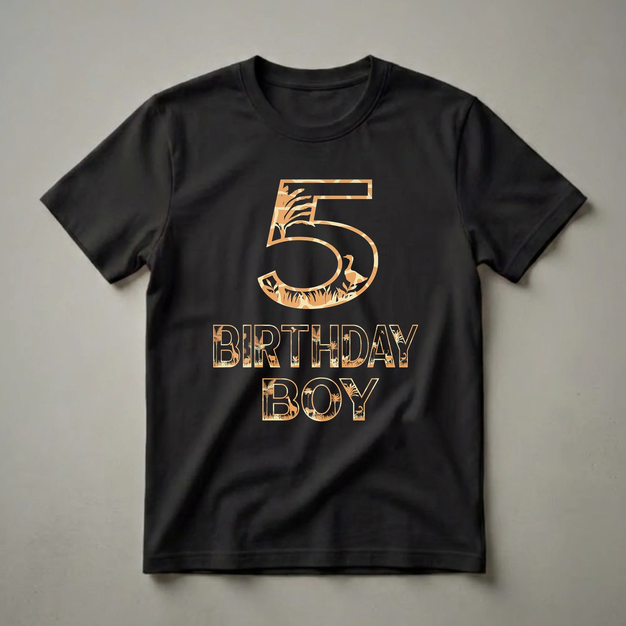 Black t-shirt with a large orange graphic featuring the number 5 and the words BIRTHDAY BOY, filled with a safari scene including giraffes, lions, rabbits, deer, and tropical plants.