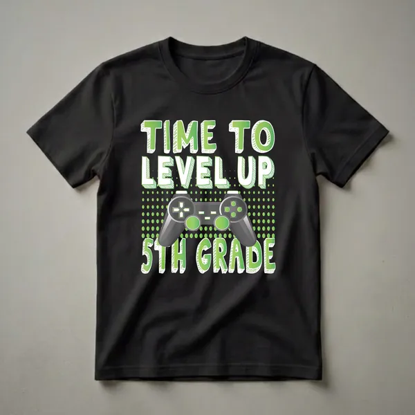 Black t-shirt with green text reading 'TIME TO LEVEL UP' and '5TH GRADE' with a video game controller in the center.