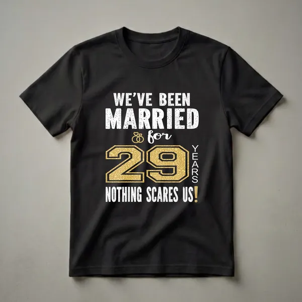 Black t-shirt with white distressed text reading 'WE'VE BEEN MARRIED & for 29 YEARS NOTHING SCARES US!' and a large gold number '29' with wedding rings.