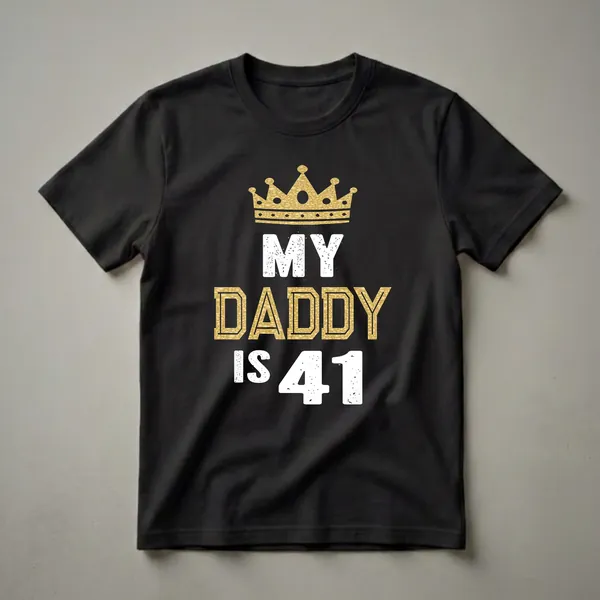 Black t-shirt with a gold glitter crown and distressed white and gold text reading 'MY DADDY IS 41'.