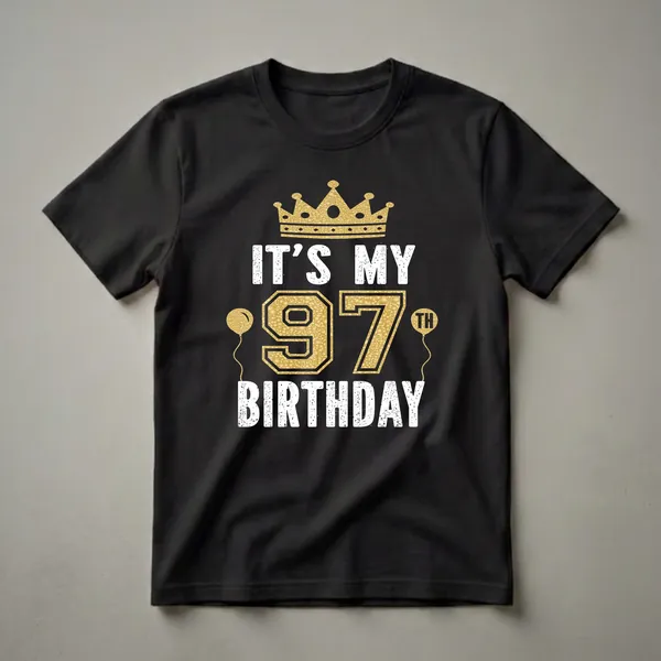 Black t-shirt with white distressed text reading 'IT'S MY' and 'BIRTHDAY', and a large gold textured number '97' with a gold crown above and gold balloons on either side.