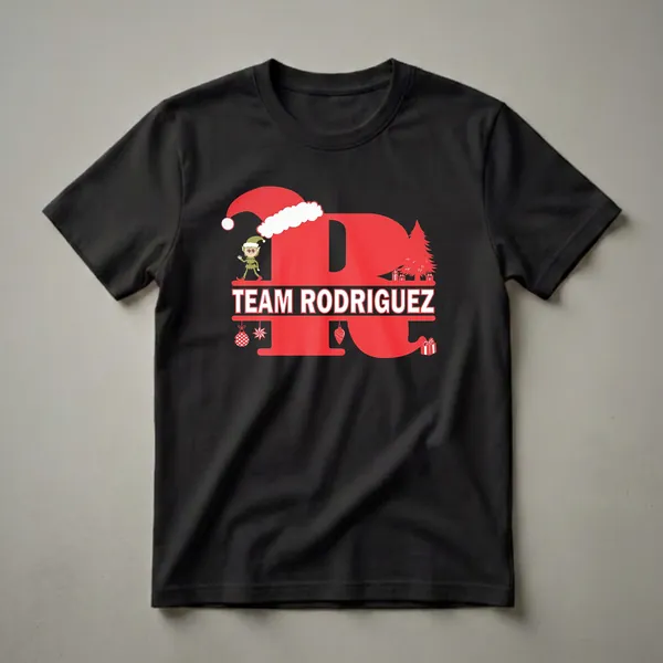 Red graphic design on a black shirt featuring the text 'TEAM RODRIGUEZ' with Christmas elements like an elf, Santa hat, Christmas tree, ornaments, and gifts.