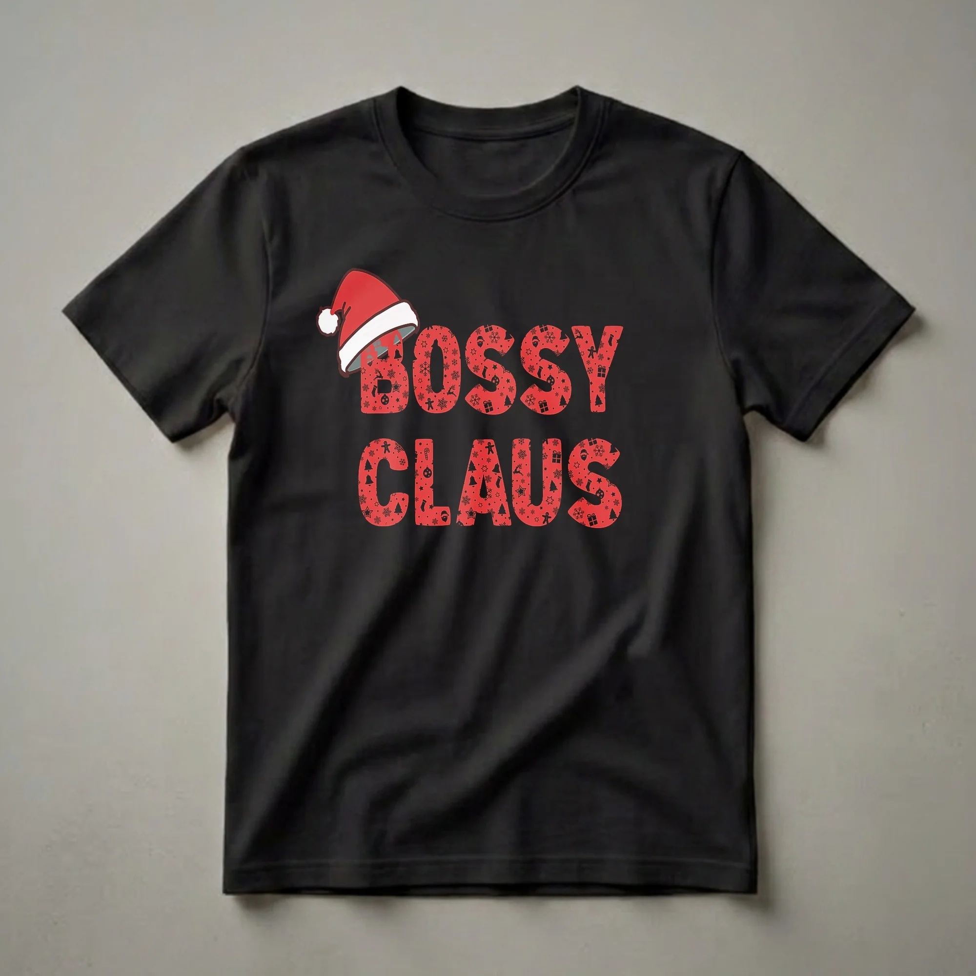Red graphic t-shirt with black text that reads 'BOSS CLAUS', filled with Christmas icons like snowflakes, gingerbread men, and Santa hats, topped with a Santa hat.